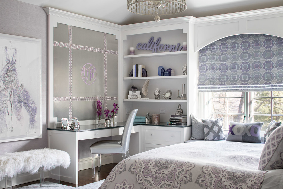 This is an example of a medium sized traditional teen’s room for girls in New York with purple walls, dark hardwood flooring and brown floors.
