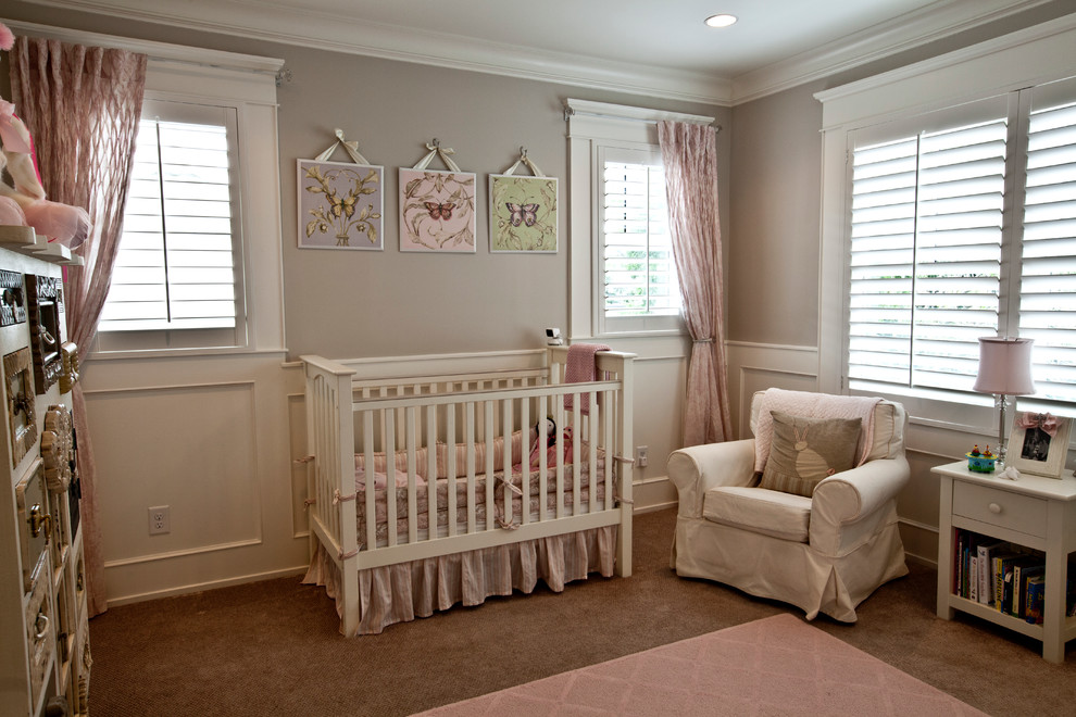 Example of a transitional nursery design in Houston