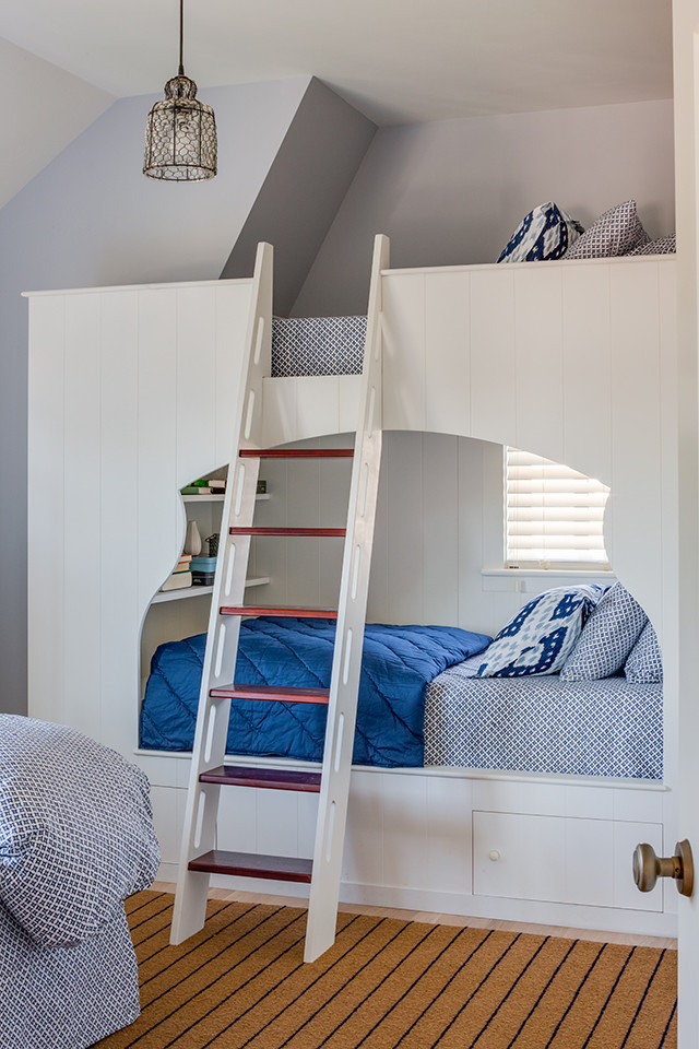 This is an example of a beach style kids' bedroom in Boston.