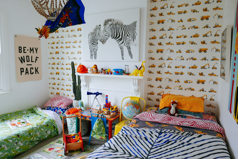 Bohemian toddler’s room for boys in Sydney with white walls and carpet.