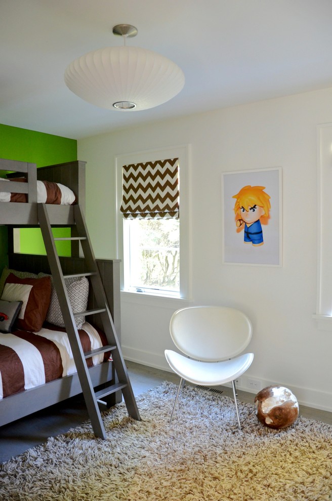 This is an example of a contemporary kids' bedroom in New York with white walls.