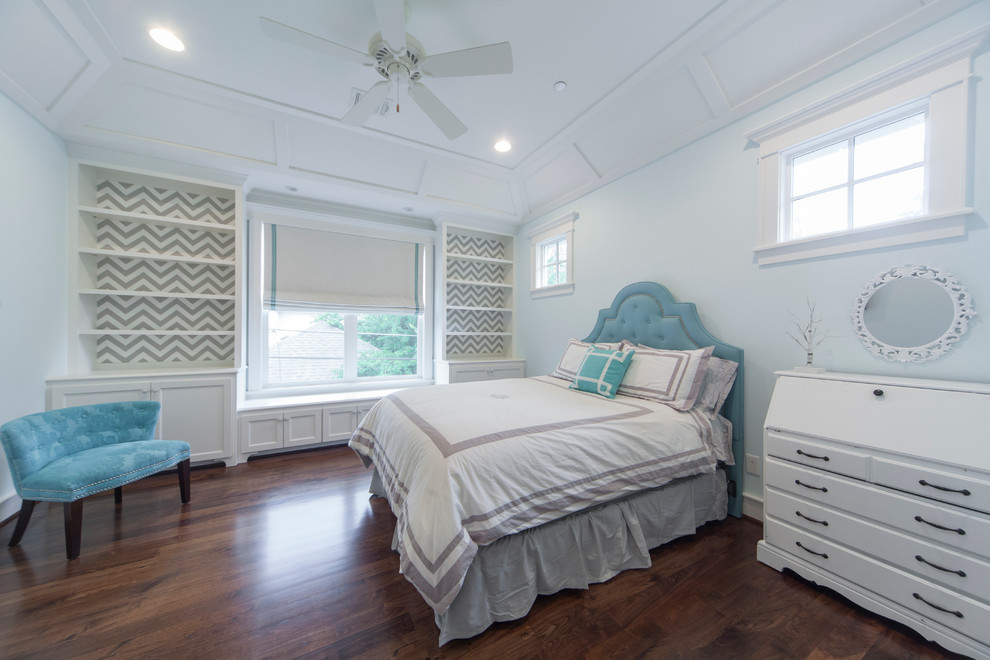 Photo of a medium sized classic teen’s room for girls in Houston with blue walls and dark hardwood flooring.