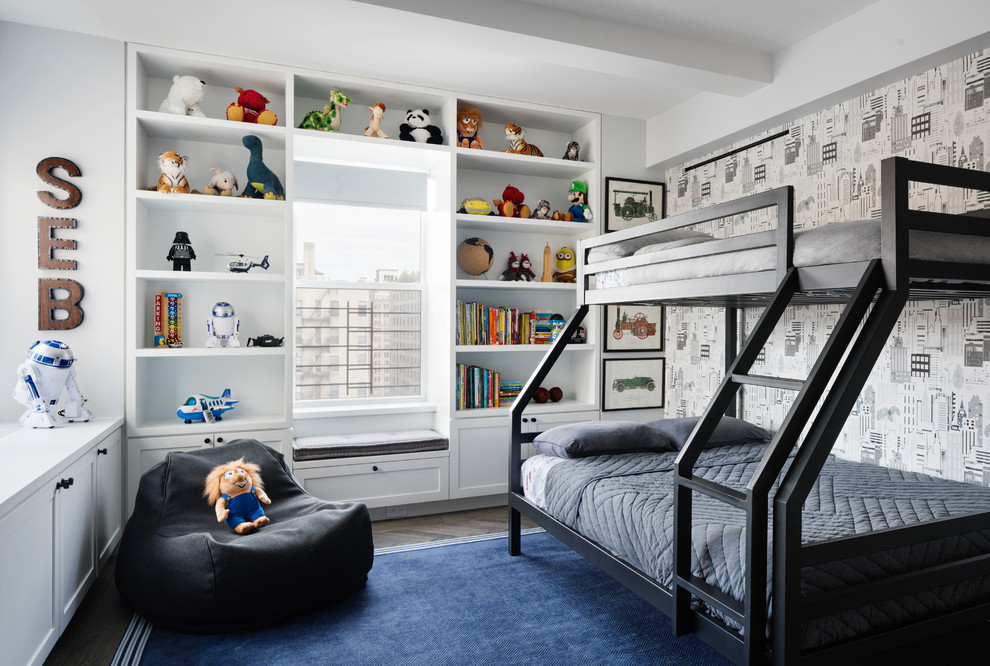This is an example of a contemporary children’s room for boys in New York with multi-coloured walls.