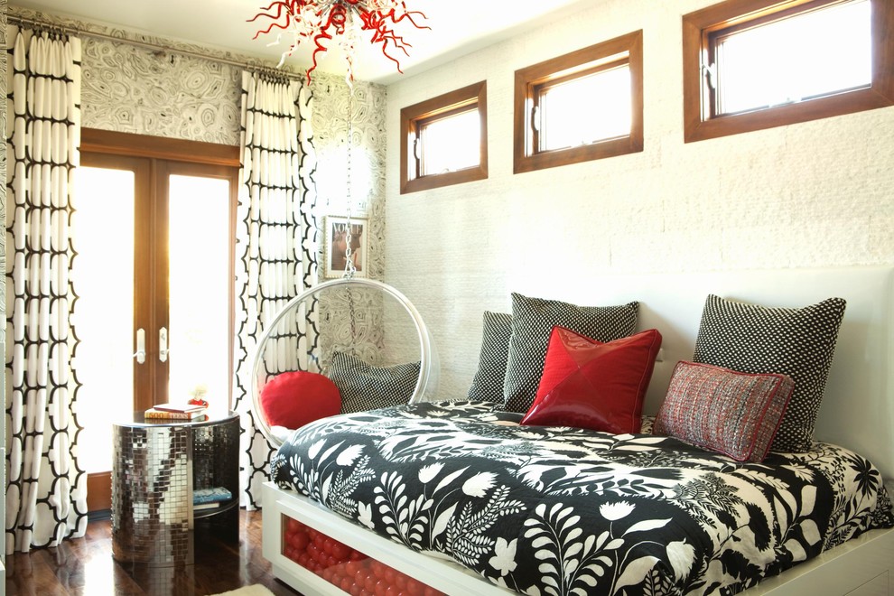 Inspiration for a contemporary teen’s room for girls in Orange County with beige walls and dark hardwood flooring.