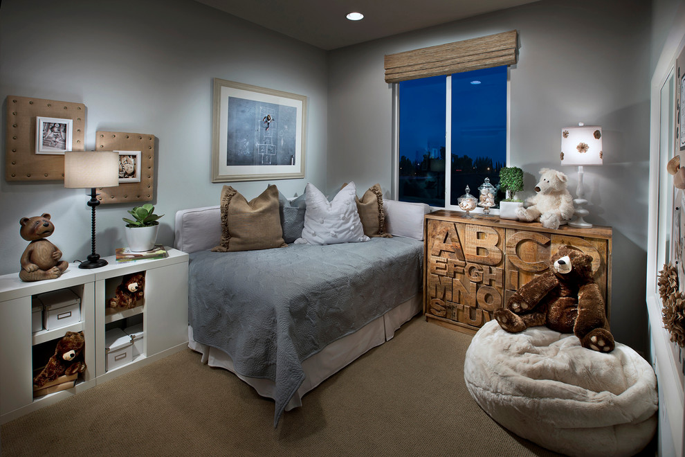 This is an example of a classic gender neutral kids' bedroom in Orange County with grey walls and carpet.