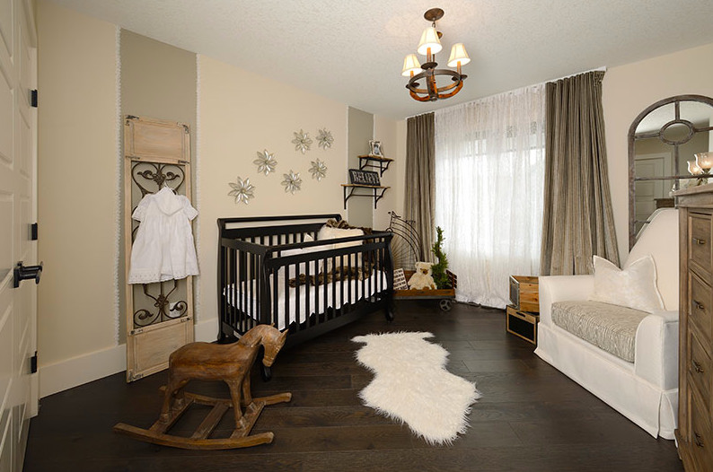 Example of a large classic gender-neutral dark wood floor nursery design in Edmonton with white walls