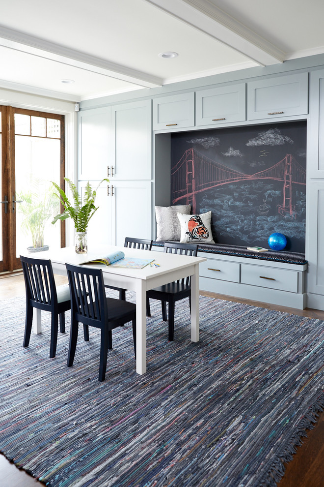 Inspiration for a large craftsman gender-neutral dark wood floor kids' room remodel in Boston with blue walls