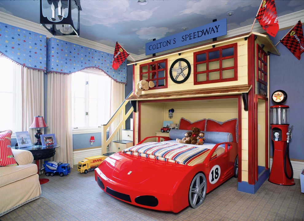 Classic toddler’s room for boys in Orange County with blue walls and carpet.