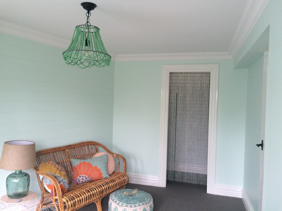 Design ideas for a medium sized coastal kids' bedroom for girls in Sydney with green walls, carpet and grey floors.