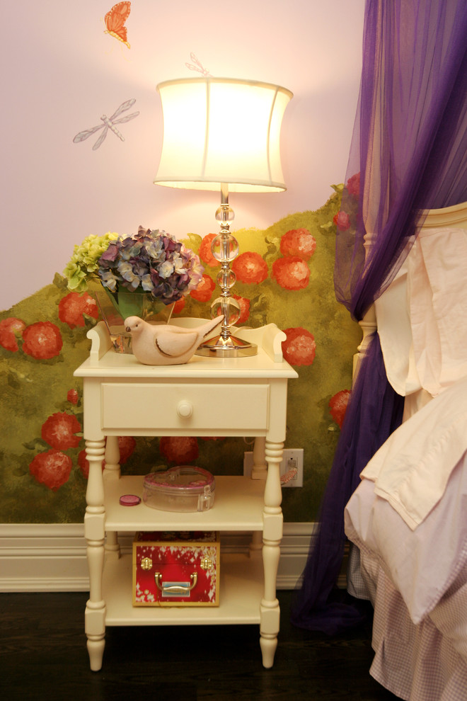 Example of a mid-sized eclectic girl dark wood floor kids' room design in Toronto with purple walls