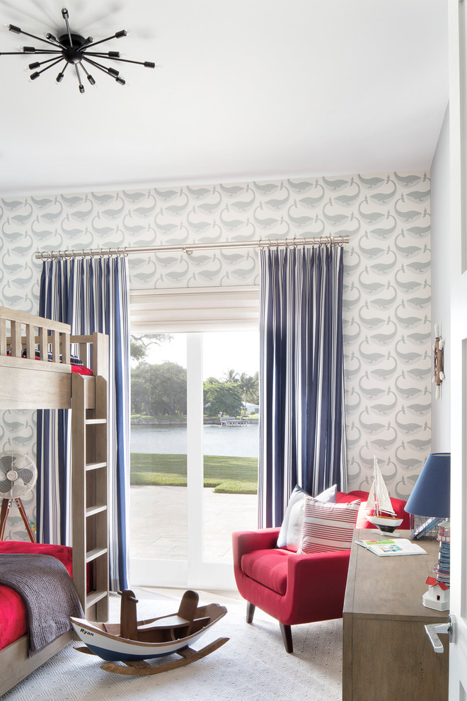 Inspiration for a coastal boy kids' room remodel in Miami with multicolored walls