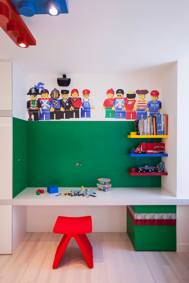 Inspiration for a contemporary boy light wood floor kids' room remodel in Other with multicolored walls