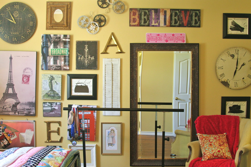 This is an example of an eclectic kids' bedroom in Austin with yellow walls.