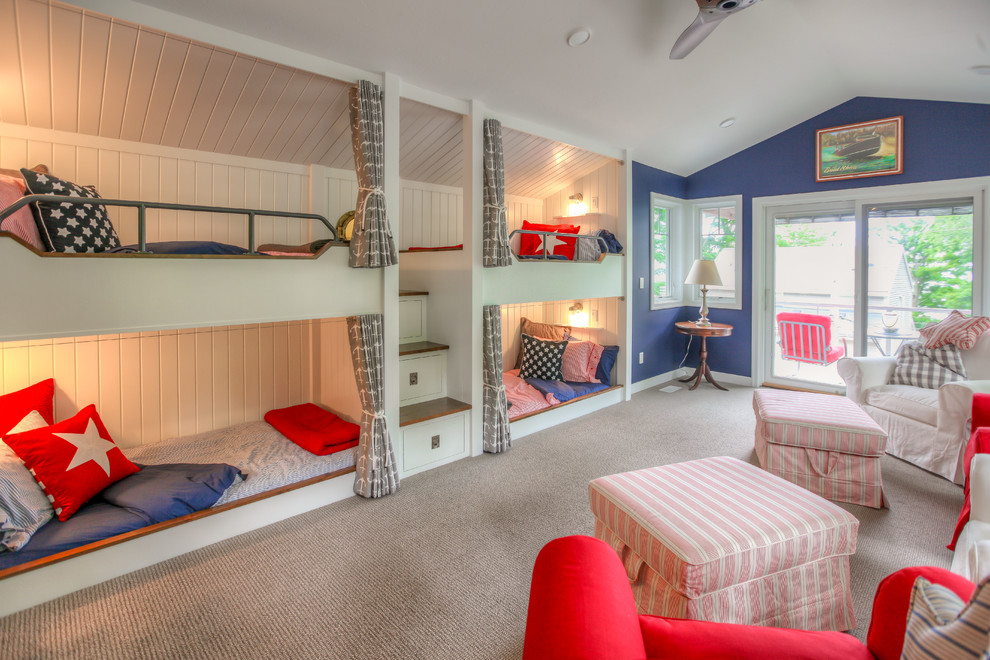 This is an example of a large rural gender neutral children’s room in Grand Rapids with blue walls and carpet.
