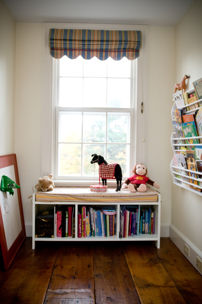 Inspiration for a timeless girl dark wood floor kids' room remodel in Manchester with white walls