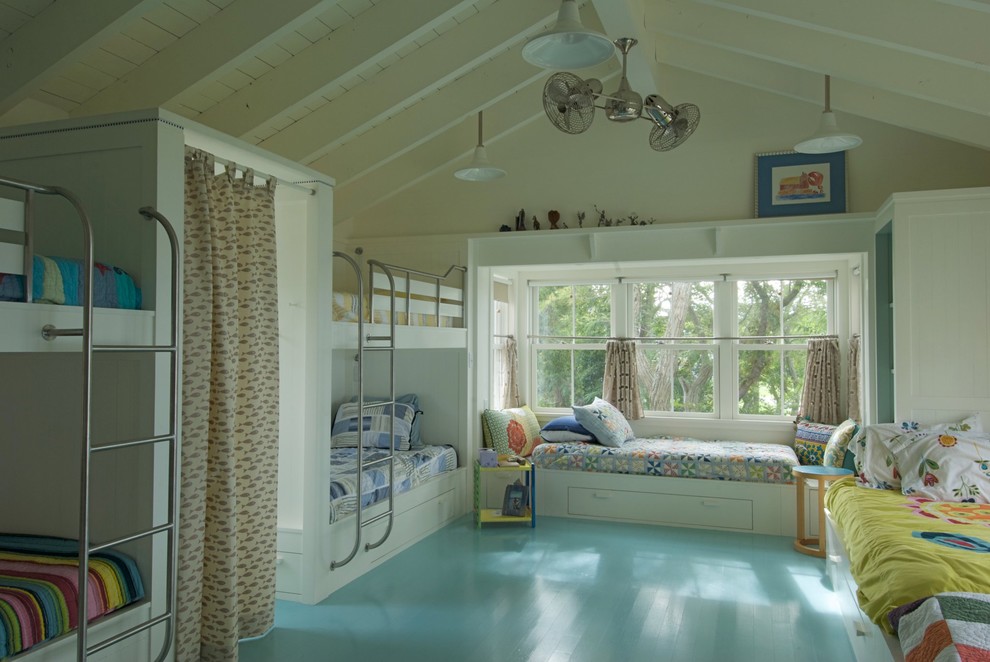 Cette image montre une chambre d'enfant marine avec un sol turquoise et parquet peint.