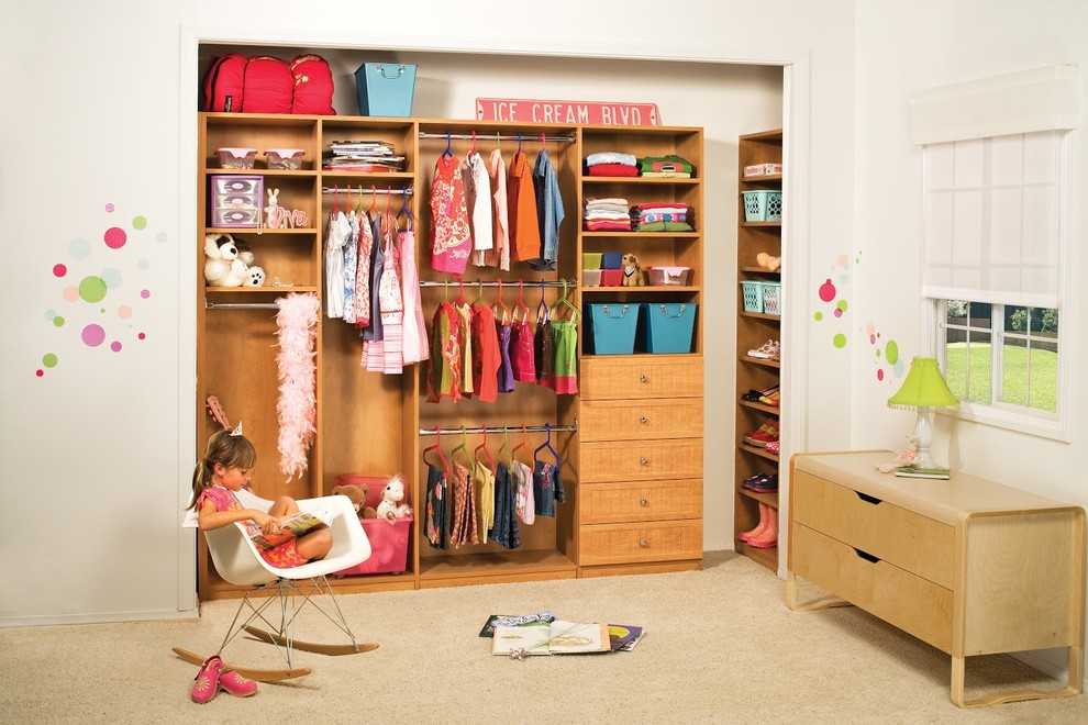 Inspiration for a medium sized traditional children’s room for girls in Dallas with beige walls and carpet.