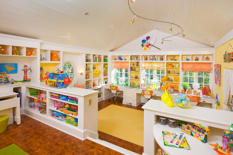 Large transitional gender-neutral medium tone wood floor playroom photo in Atlanta with white walls
