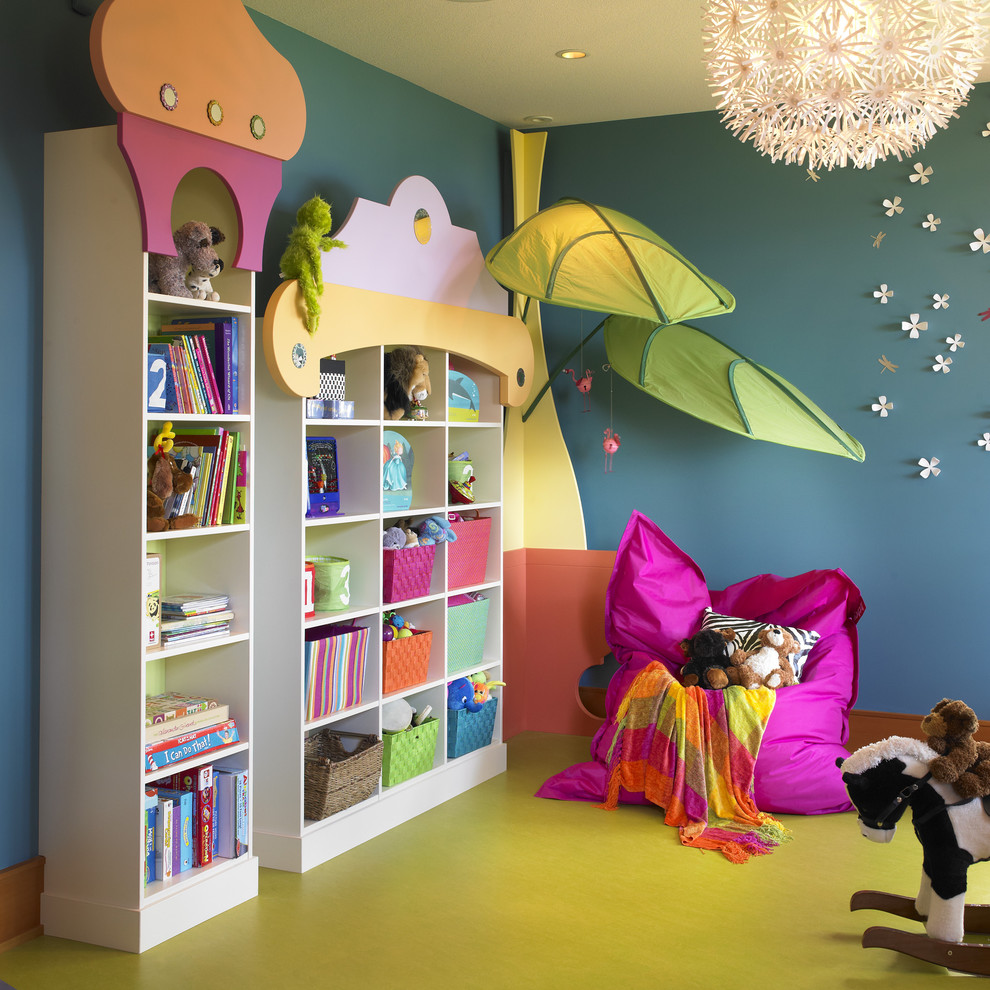 Inspiration for a bohemian playroom in Vancouver with blue walls and green floors.