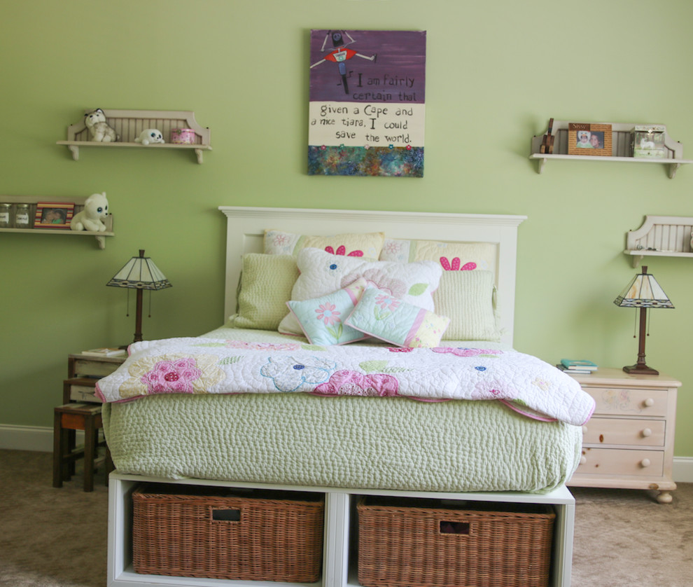 Photo of a medium sized vintage children’s room for girls in Atlanta with green walls and carpet.