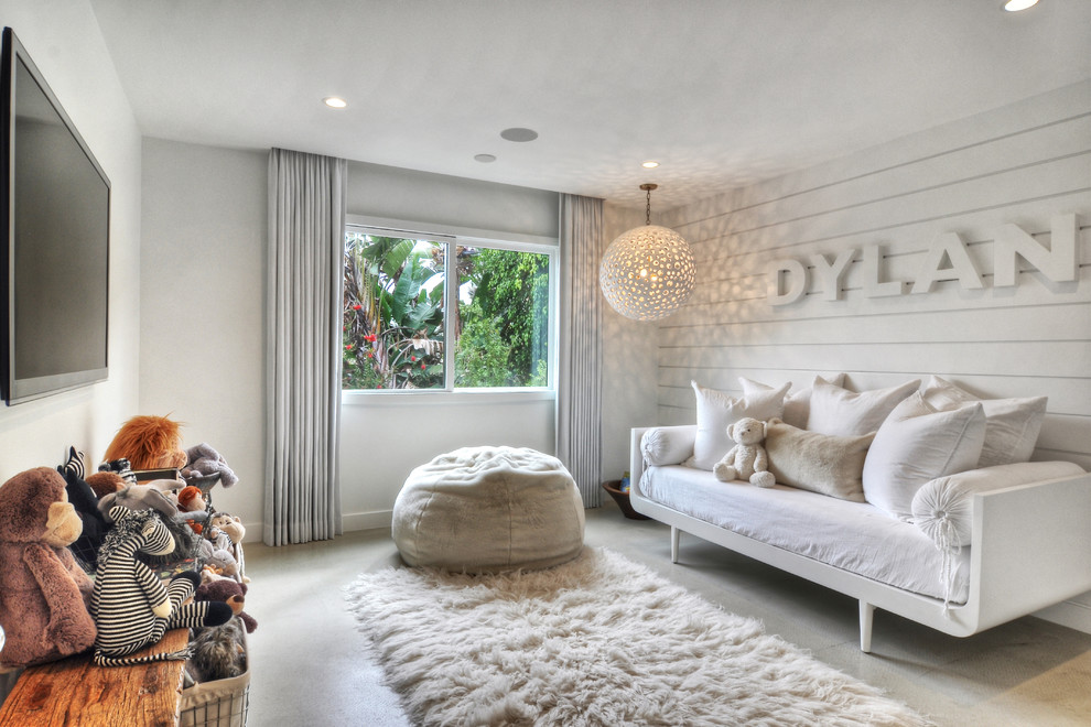 Inspiration for a contemporary girl concrete floor kids' bedroom remodel in Orange County with white walls