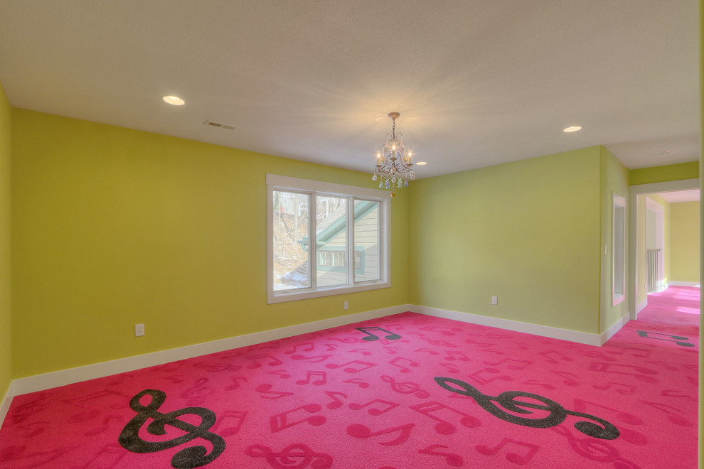 Example of a mid-sized beach style girl carpeted kids' room design in Kansas City with green walls