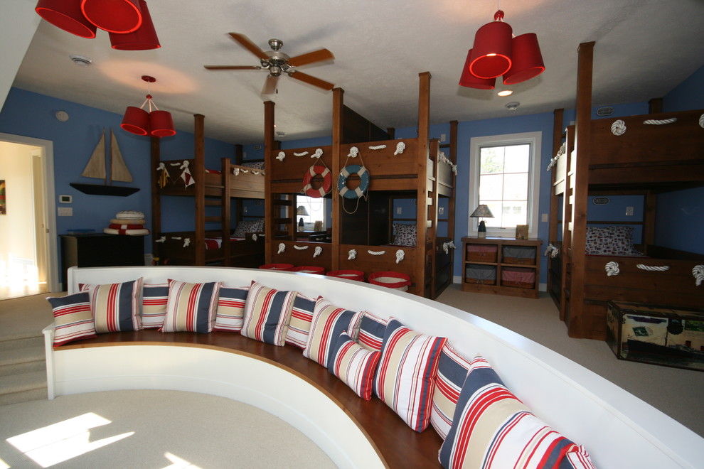 Photo of a classic gender neutral children’s room in Grand Rapids with blue walls and carpet.