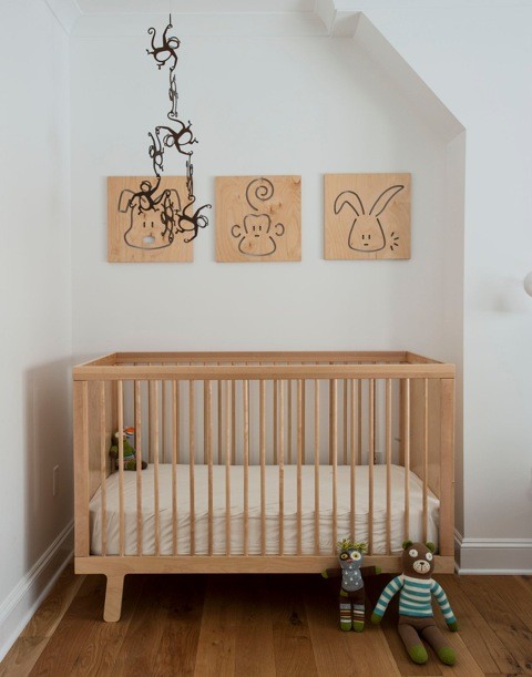 Inspiration for a medium sized classic gender neutral nursery in New York with white walls and medium hardwood flooring.