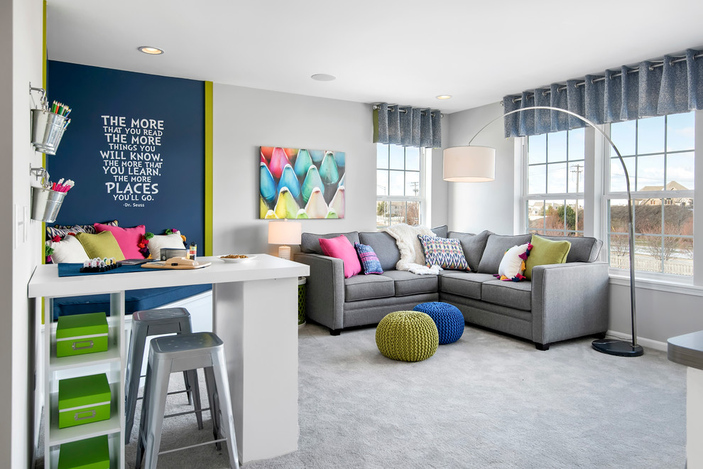 This is an example of a medium sized contemporary gender neutral kids' bedroom in Chicago with carpet, white walls and grey floors.