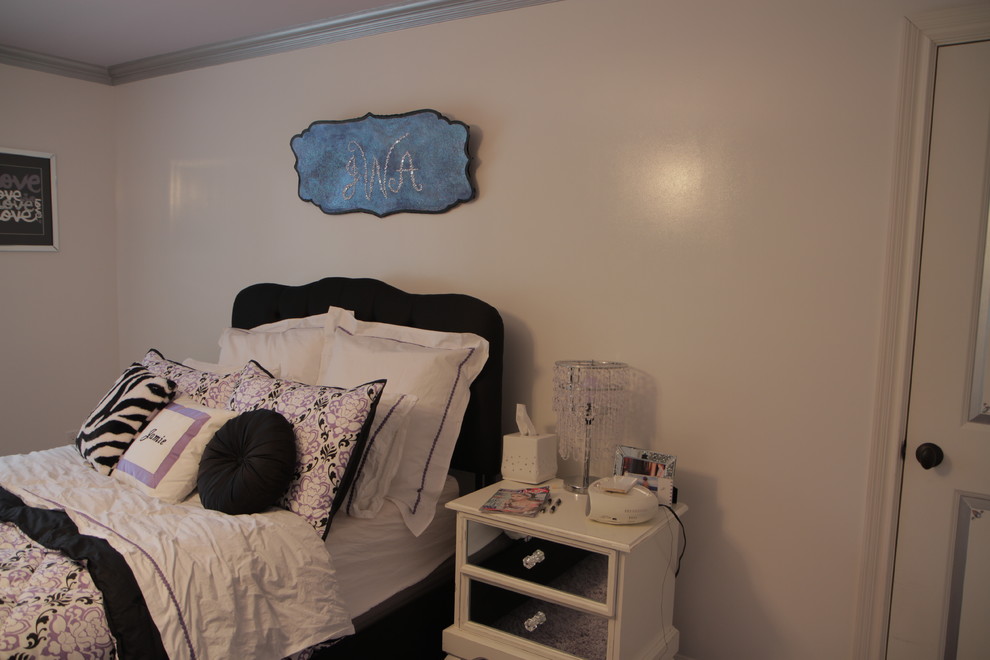 Photo of a medium sized modern teen’s room for girls in New York with white walls and carpet.