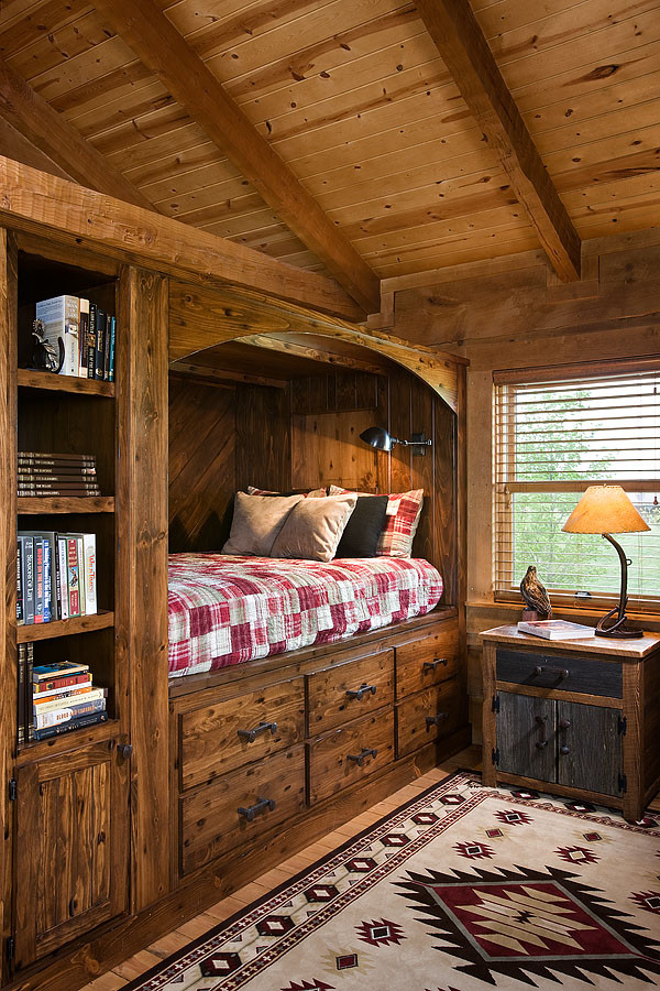 Example of a mid-sized classic boy medium tone wood floor and brown floor kids' room design in Nashville with brown walls