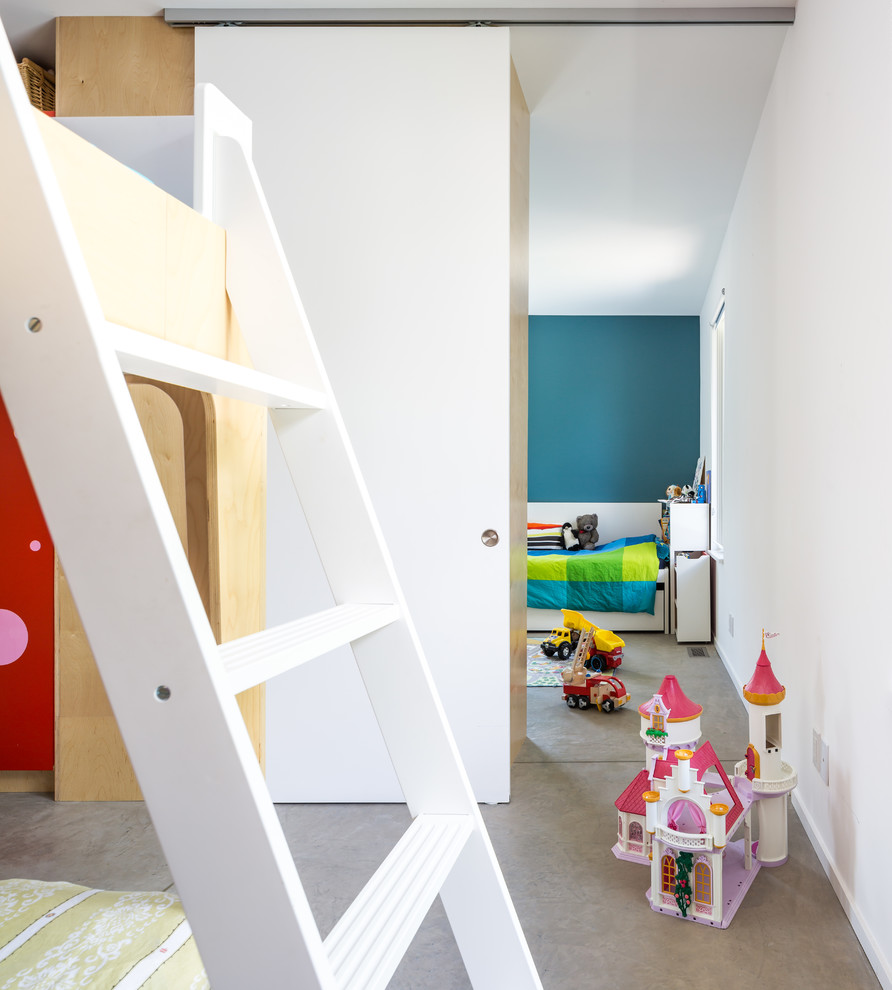 Источник вдохновения для домашнего уюта: большая нейтральная детская в современном стиле с спальным местом и бетонным полом для ребенка от 4 до 10 лет