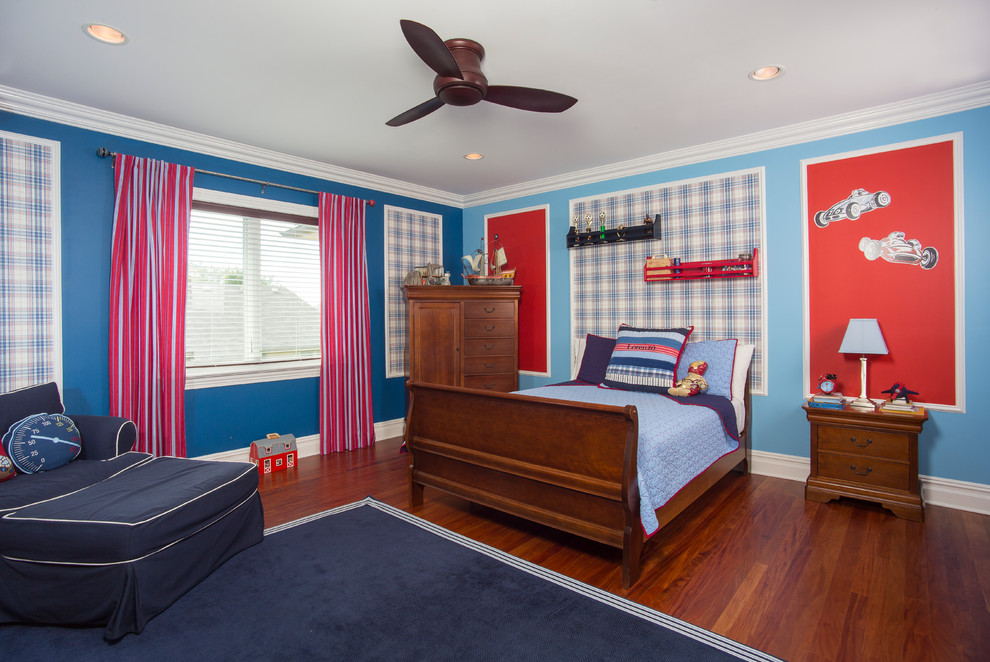 Foto di una cameretta per bambini classica con pareti blu