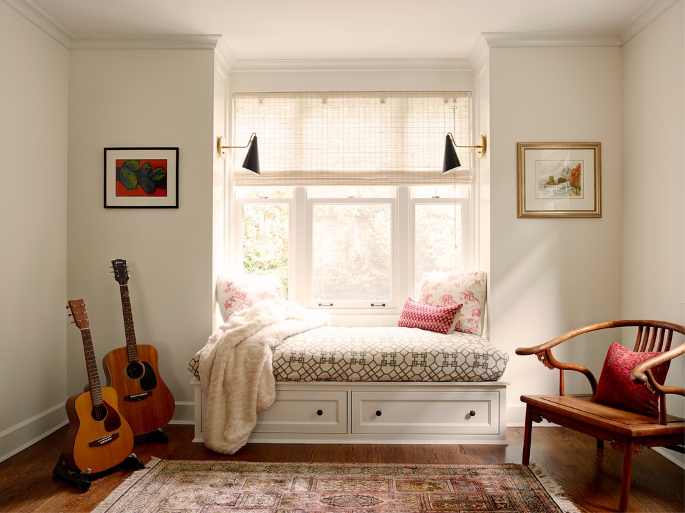 Design ideas for a traditional teen’s room for girls in Seattle with beige walls and dark hardwood flooring.