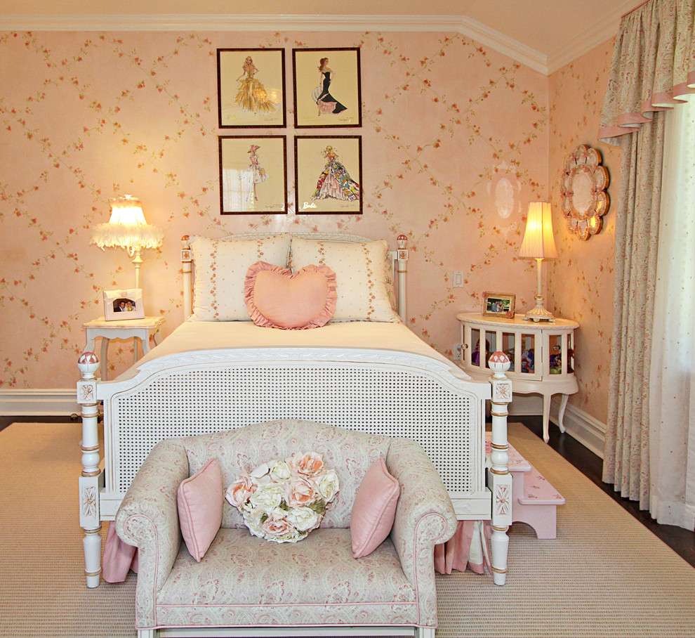 Design ideas for a vintage children’s room for girls in New York with pink walls and dark hardwood flooring.
