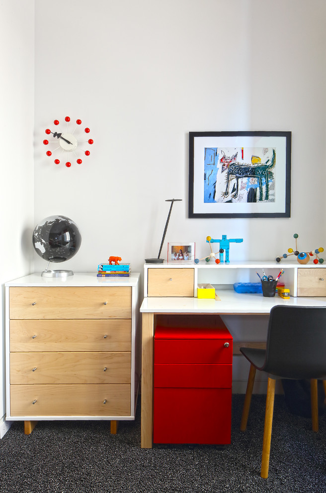 This is an example of a medium sized contemporary gender neutral children’s room in New York with white walls and carpet.