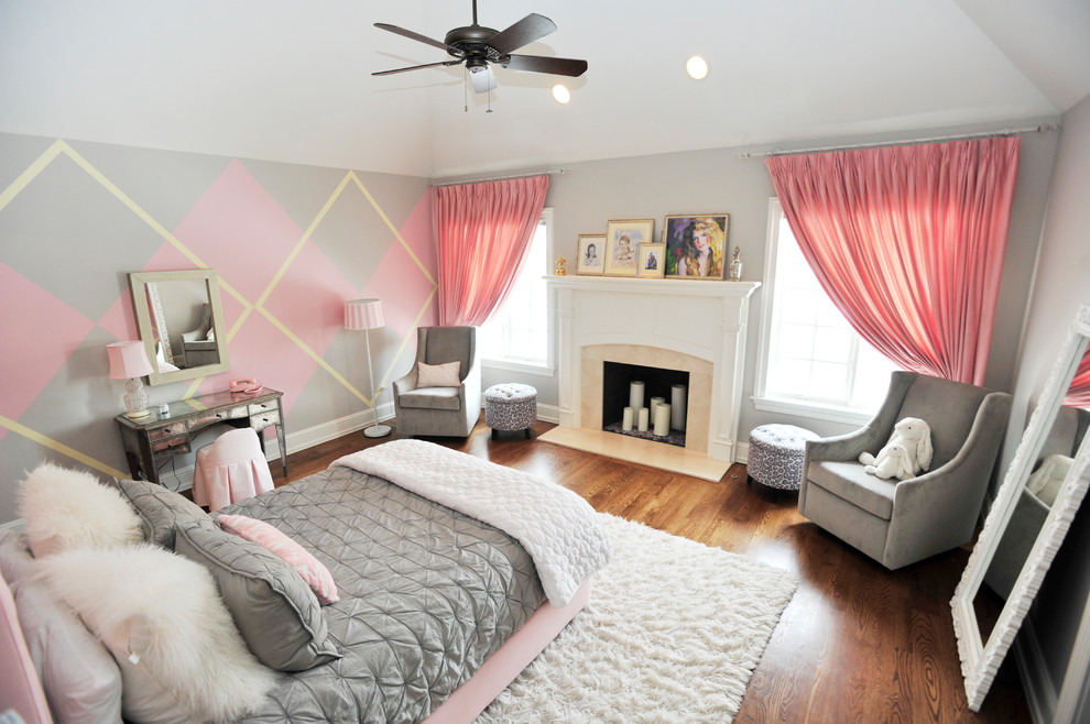Photo of a medium sized romantic teen’s room for girls in Chicago with grey walls, light hardwood flooring and brown floors.