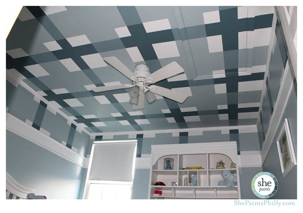 Inspiration for a mid-sized contemporary boy kids' room remodel in Philadelphia with blue walls