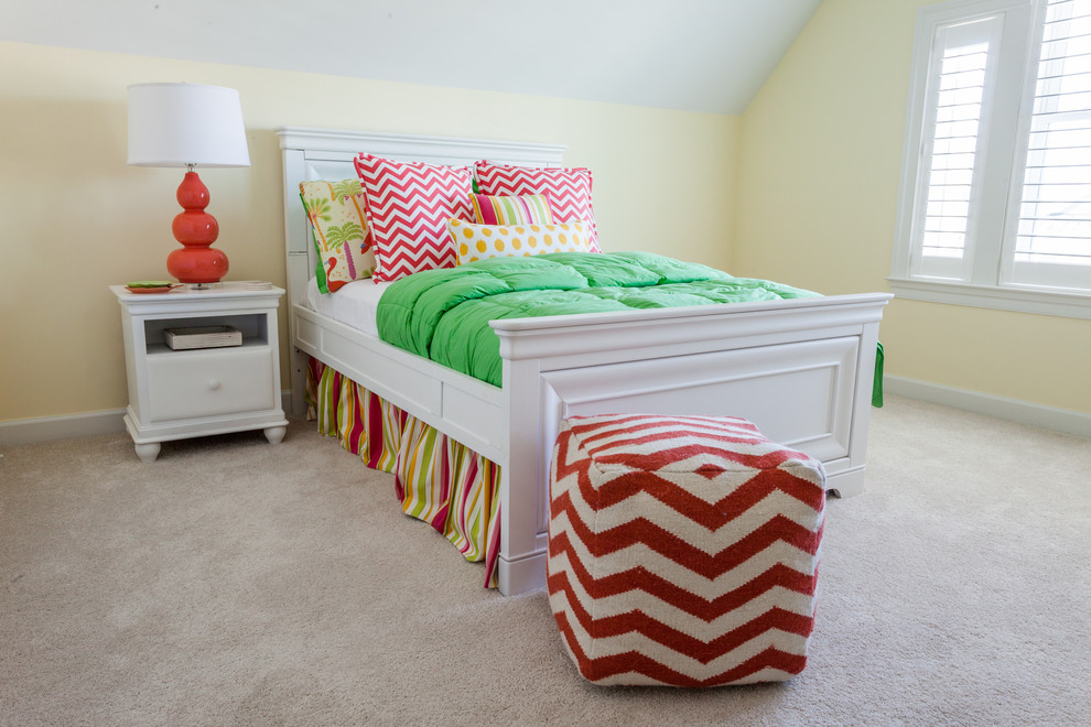 Example of a beach style carpeted kids' bedroom design in Other with yellow walls
