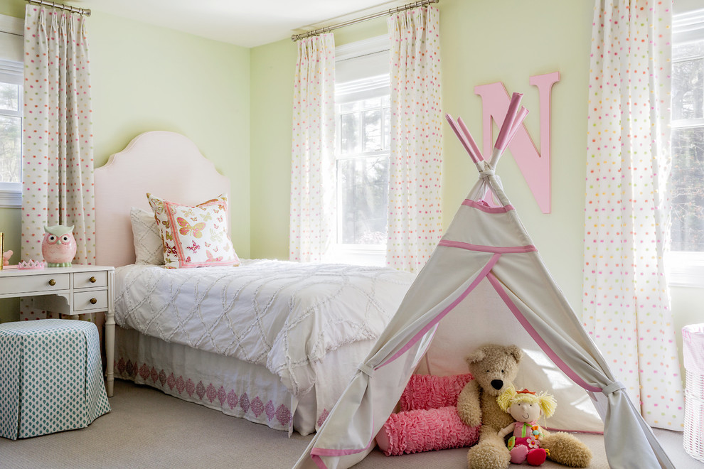 Inspiration for a medium sized traditional children’s room for girls in Boston with yellow walls, carpet and beige floors.