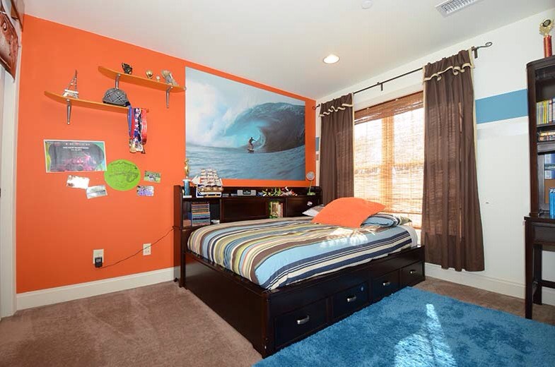 Mid-sized trendy boy carpeted kids' room photo in Philadelphia with blue walls