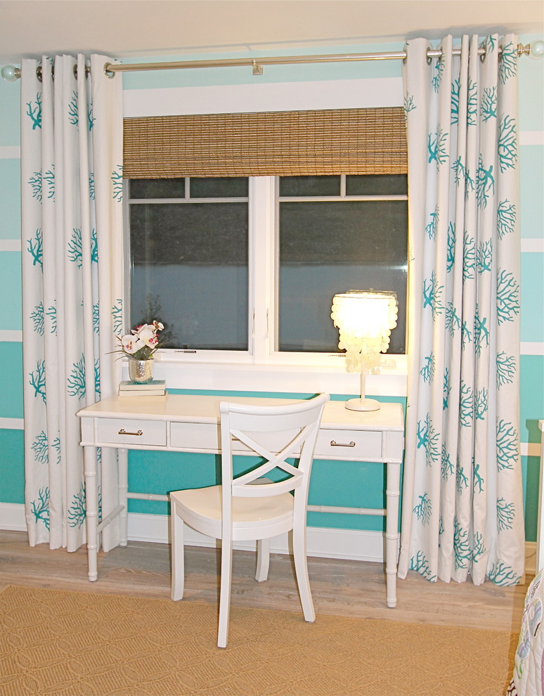 This is an example of a coastal kids' bedroom in Orange County.