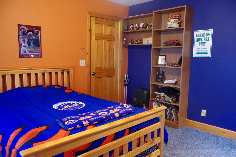 Immagine di una cameretta per bambini boho chic di medie dimensioni con pareti multicolore
