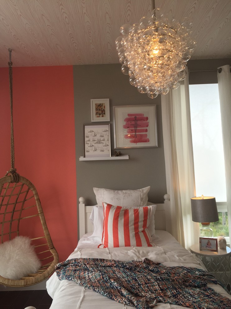 Foto di una cameretta per bambini design di medie dimensioni con pareti rosa
