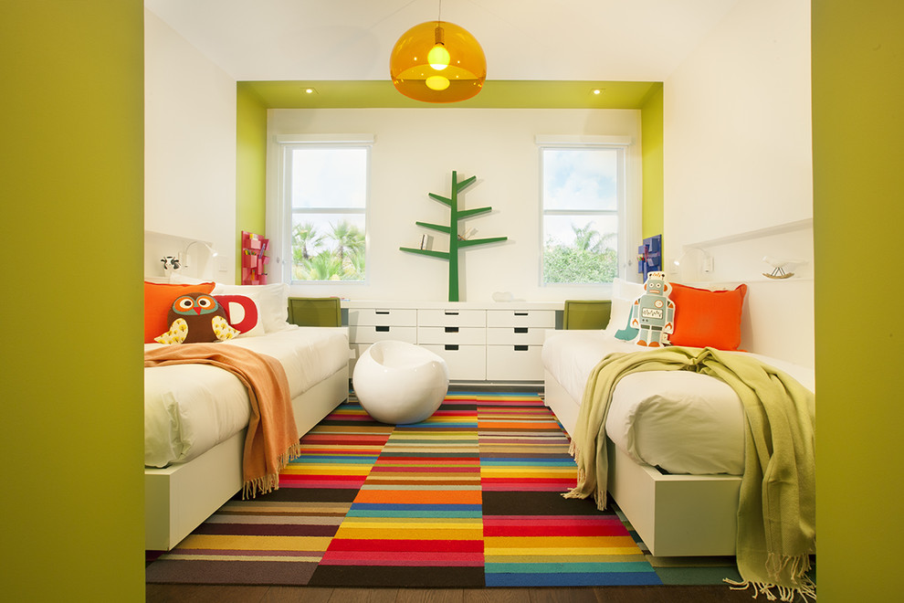 Trendy gender-neutral carpeted kids' bedroom photo in Miami with multicolored walls