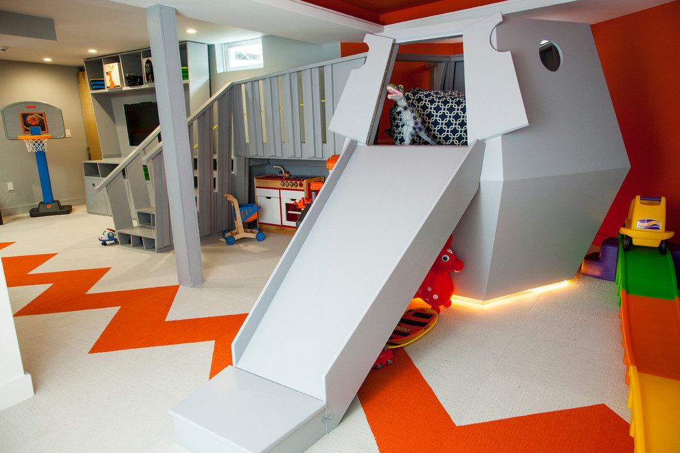 Idée de décoration pour une chambre d'enfant de 4 à 10 ans minimaliste de taille moyenne avec moquette et un mur multicolore.