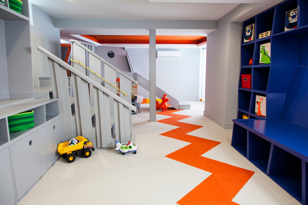 Inspiration for a mid-sized modern boy carpeted kids' room remodel in Boston with multicolored walls