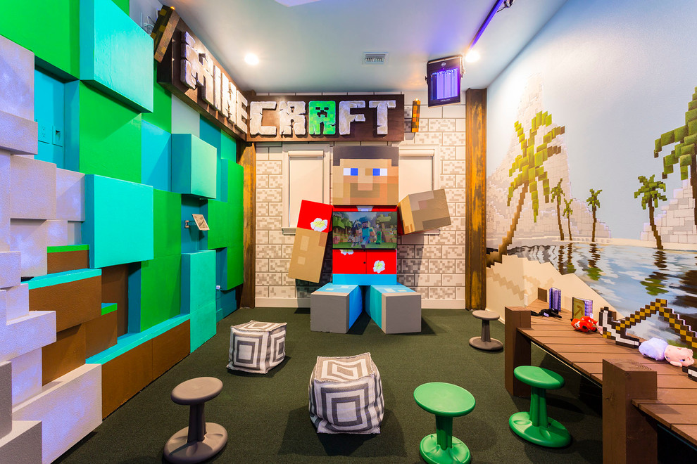 Esempio di una grande cameretta per bambini minimalista con pareti multicolore e moquette