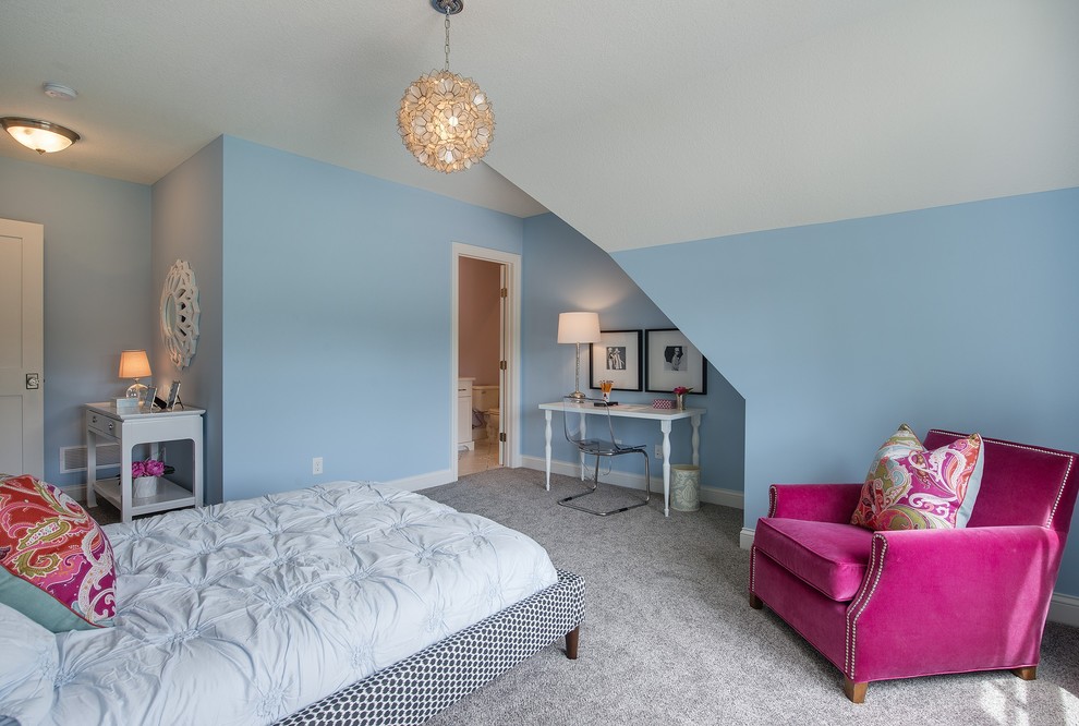 Inspiration for a large classic children’s room for girls in Minneapolis with blue walls and carpet.