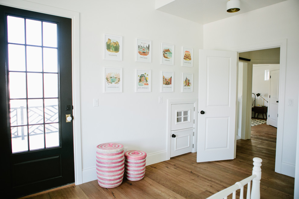 Design ideas for a farmhouse gender neutral children’s room in Salt Lake City with multi-coloured walls.